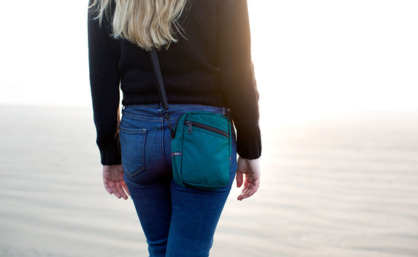 Person wearing the Everyday Cubelet at the beach.